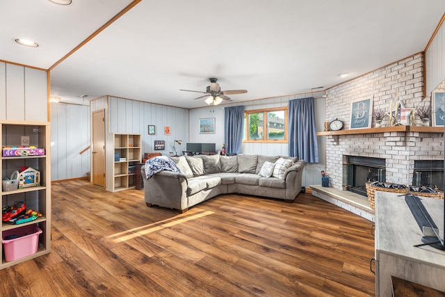 15317 S 73rd Ave Unit 8, Orland Park, IL 60462 - living room with ceiling fan, a brick fireplace, and wood finished floors