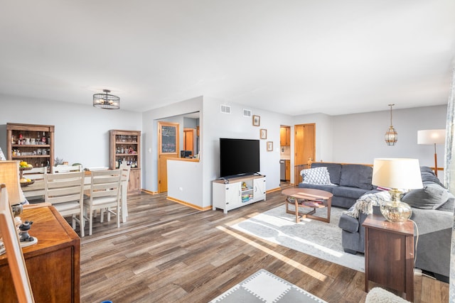 15317 S 73rd Ave Unit 8, Orland Park, IL 60462 - living room featuring wood finished floors and baseboards