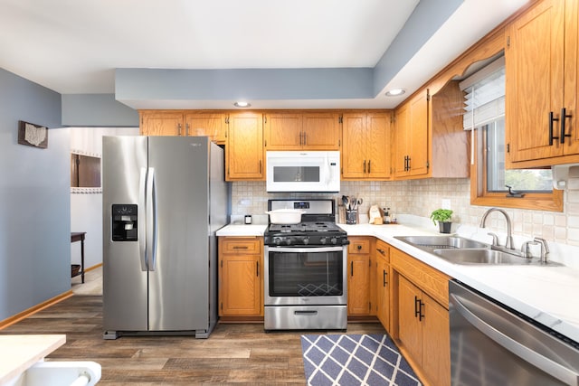15317 S 73rd Ave Unit 8, Orland Park, IL 60462 - kitchen featuring appliances with stainless steel finishes, dark wood finished floors, light countertops, and recessed lighting