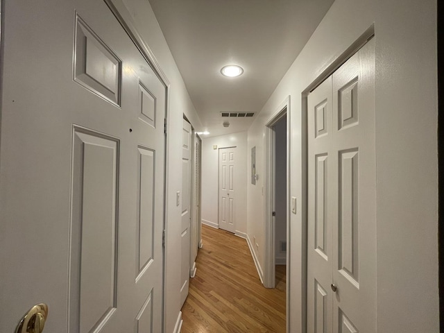 6938 S Dorchester Ave Unit 2, Chicago, IL 60637 - hall featuring light wood-style floors and baseboards