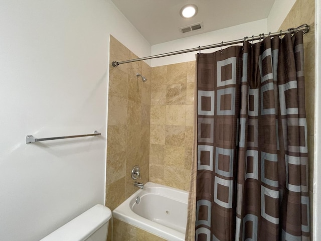 6938 S Dorchester Ave Unit 2, Chicago, IL 60637 - bathroom featuring shower / bath combination with curtain and toilet