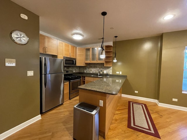 6938 S Dorchester Ave Unit 2, Chicago, IL 60637 - kitchen with appliances with stainless steel finishes, a peninsula, open shelves, decorative backsplash, and light brown cabinetry