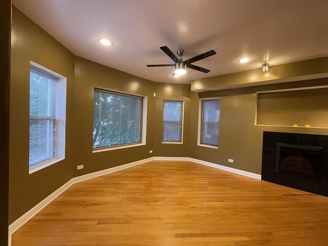 6938 S Dorchester Ave Unit 2, Chicago, IL 60637 - unfurnished living room with light wood-type flooring, ceiling fan, recessed lighting, and a fireplace