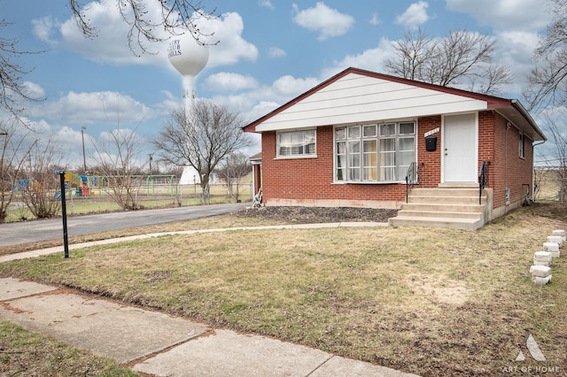 16956 Sunset Ridge Dr, Country Club Hills, IL 60478 - view of front of home featuring brick siding, entry steps, and asphalt driveway