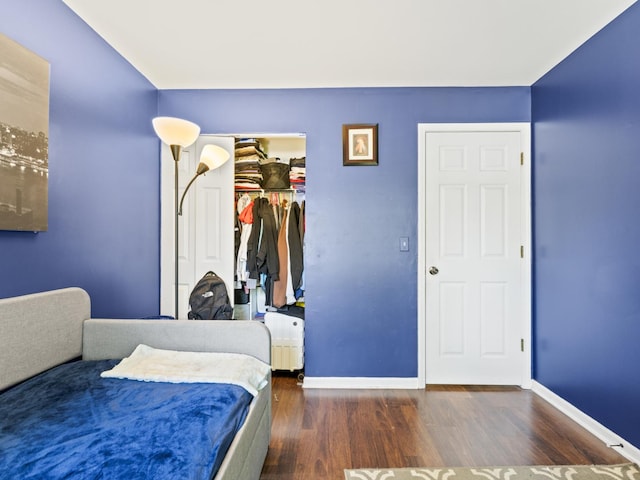 1400 Ashton Ct Unit B1, Wheeling, IL 60090 - bedroom featuring wood finished floors, a closet, and radiator heating unit