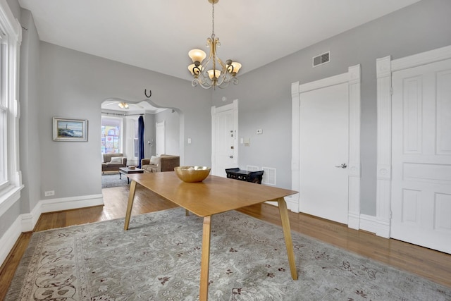 1848 W Cermak Rd Unit 3, Chicago, IL 60608 - office with wood finished floors, arched walkways, and a chandelier