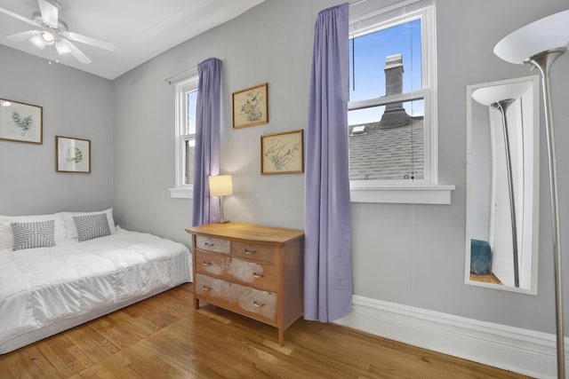 1848 W Cermak Rd Unit 3, Chicago, IL 60608 - bedroom featuring wood finished floors and a ceiling fan