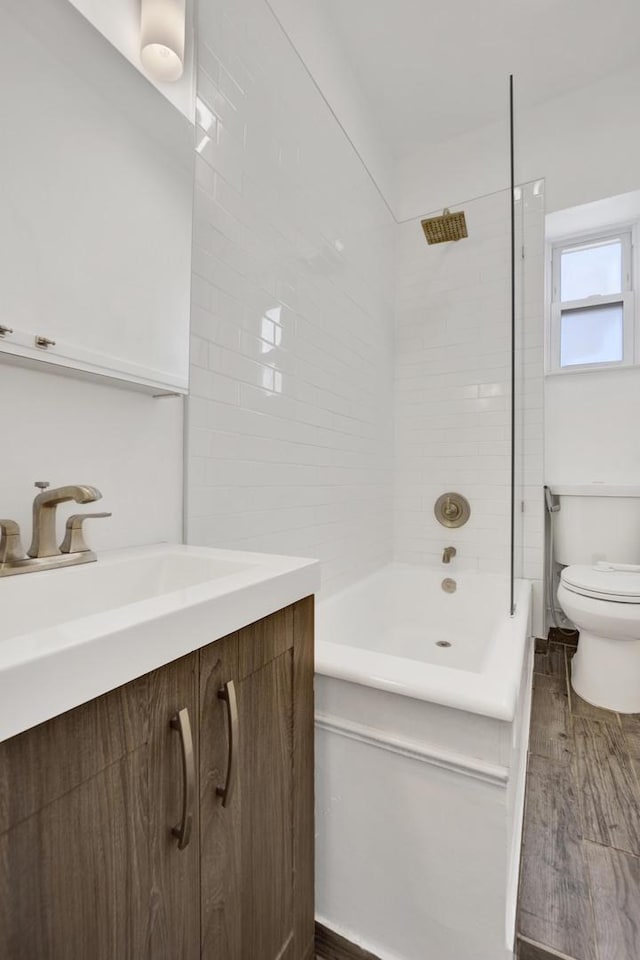 1848 W Cermak Rd Unit 3, Chicago, IL 60608 - bathroom featuring vanity, tub / shower combination, and wood finished floors