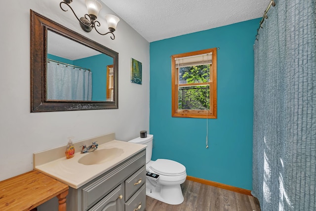1819 Il Route 176, Crystal Lake, IL 60014 - full bathroom with wood finished floors, vanity, and a textured ceiling