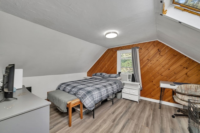 1819 Il Route 176, Crystal Lake, IL 60014 - bedroom with vaulted ceiling, wood finished floors, cooling unit, and wood walls