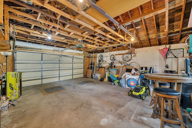 1819 Il Route 176, Crystal Lake, IL 60014 - garage with a garage door opener and water heater