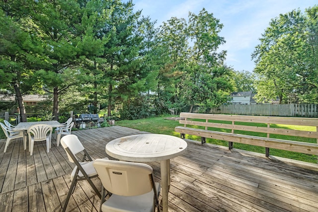 1819 Il Route 176, Crystal Lake, IL 60014 - wooden terrace with outdoor dining space and view of scattered trees
