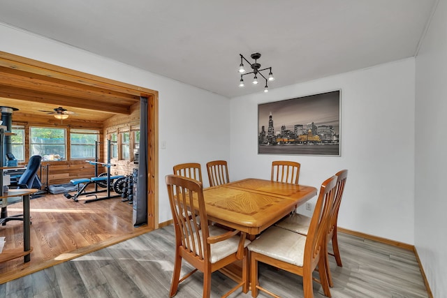 1819 Il Route 176, Crystal Lake, IL 60014 - dining space featuring wood finished floors and a chandelier