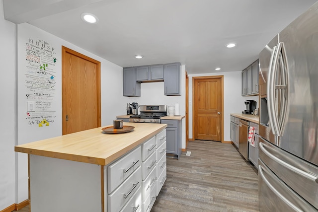 1819 Il Route 176, Crystal Lake, IL 60014 - kitchen featuring stainless steel appliances, wood counters, light wood-type flooring, recessed lighting, and gray cabinetry