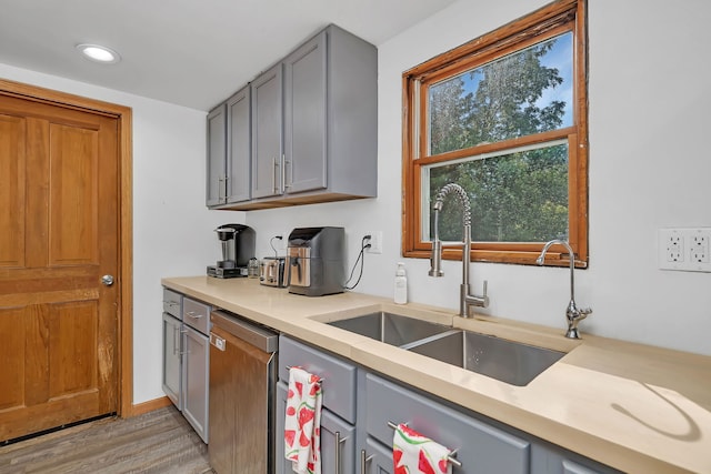 1819 Il Route 176, Crystal Lake, IL 60014 - kitchen featuring gray cabinetry, light wood-type flooring, light countertops, dishwasher, and recessed lighting