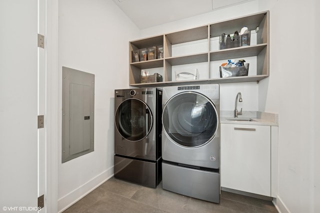 403 N Wabash Ave Unit 17C, Chicago, IL 60611 - washroom with electric panel, washer and dryer, and tile patterned flooring