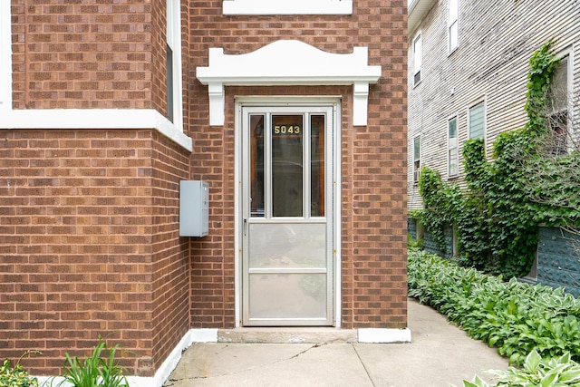 5043 W Argyle St, Chicago, IL 60630 - property entrance with brick siding