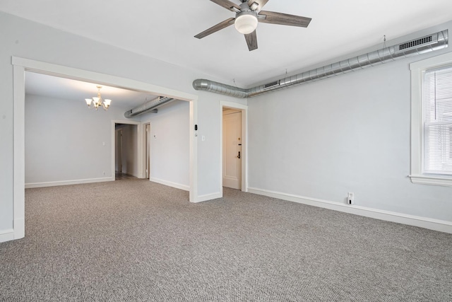 5043 W Argyle St, Chicago, IL 60630 - carpeted empty room with ceiling fan and a chandelier