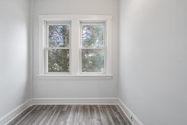 5043 W Argyle St, Chicago, IL 60630 - spare room featuring dark wood finished floors and baseboards