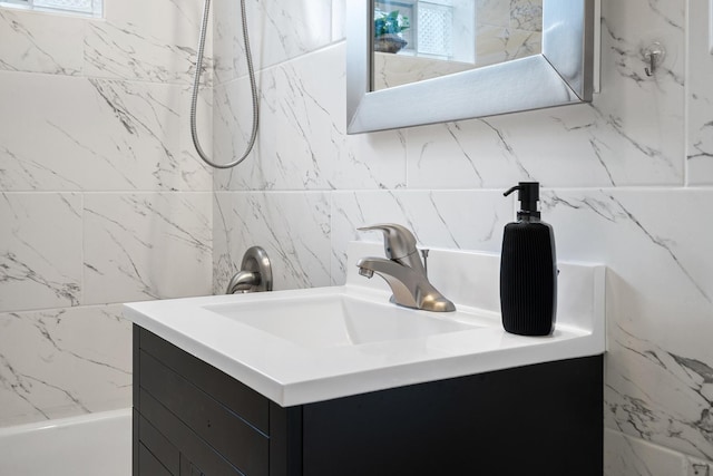 5043 W Argyle St, Chicago, IL 60630 - bathroom featuring vanity and  shower combination