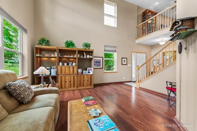 937 Emerald Dr, Pingree Grove, IL 60140 - living area with a towering ceiling, wood finished floors, and stairs
