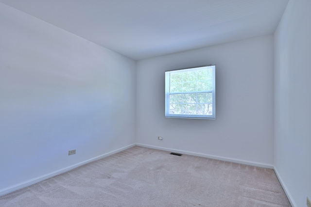 633 Ascot Ln, Streamwood, IL 60107 - empty room featuring carpet flooring