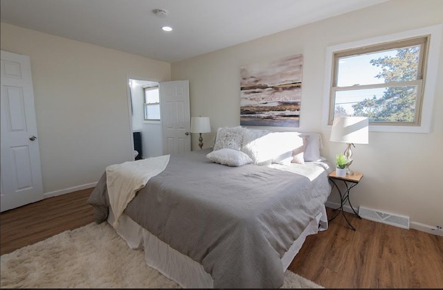 507 Wingate Dr, Schaumburg, IL 60193 - bedroom with wood finished floors and recessed lighting