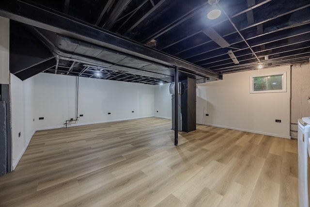 507 Wingate Dr, Schaumburg, IL 60193 - below grade area featuring wood finished floors and baseboards