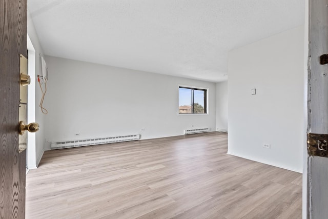 124 Klein Creek Ct Unit 5E, Carol Stream, IL 60188 - unfurnished room featuring baseboard heating and light wood finished floors