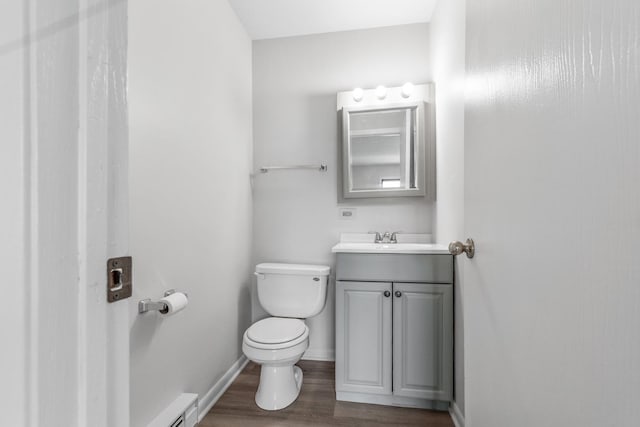 124 Klein Creek Ct Unit 5E, Carol Stream, IL 60188 - bathroom with vanity, wood finished floors, and a baseboard radiator