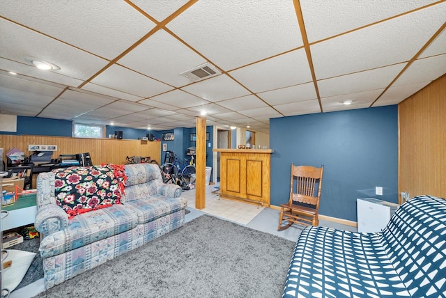21207 Locust St, Matteson, IL 60443 - living area with wood walls, a paneled ceiling, and bar