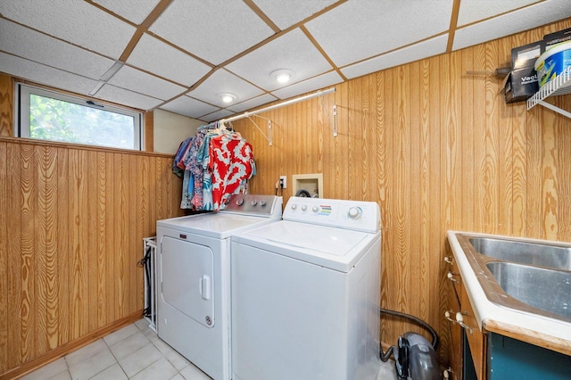 21207 Locust St, Matteson, IL 60443 - laundry area featuring wooden walls, separate washer and dryer, and light tile patterned flooring