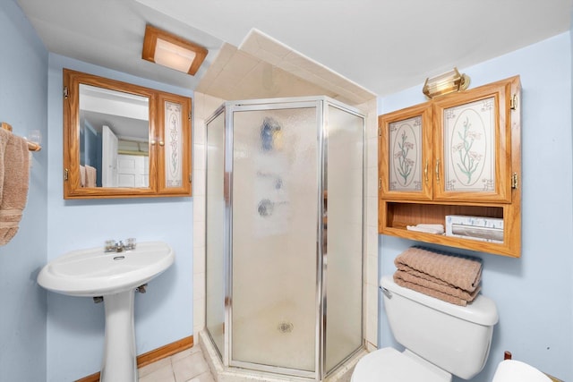 21207 Locust St, Matteson, IL 60443 - bathroom with a shower stall and tile patterned flooring