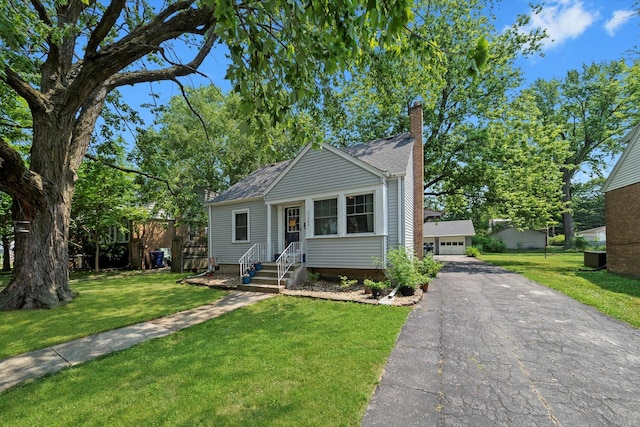 21207 Locust St, Matteson, IL 60443 - bungalow-style home with a chimney, a shingled roof, a front lawn, and a garage