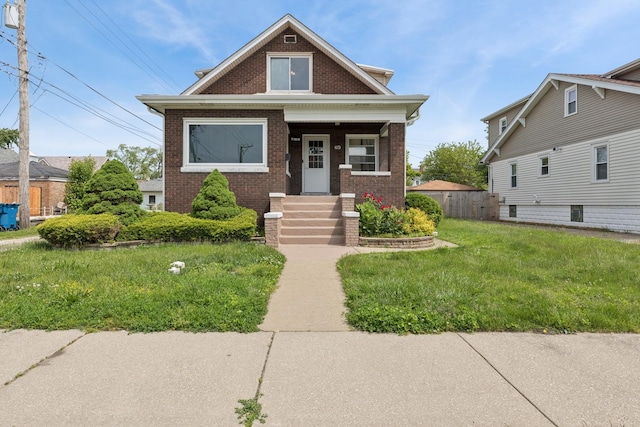 334 153rd St, Calumet City, IL 60409 - view of front of house featuring brick siding and a front lawn