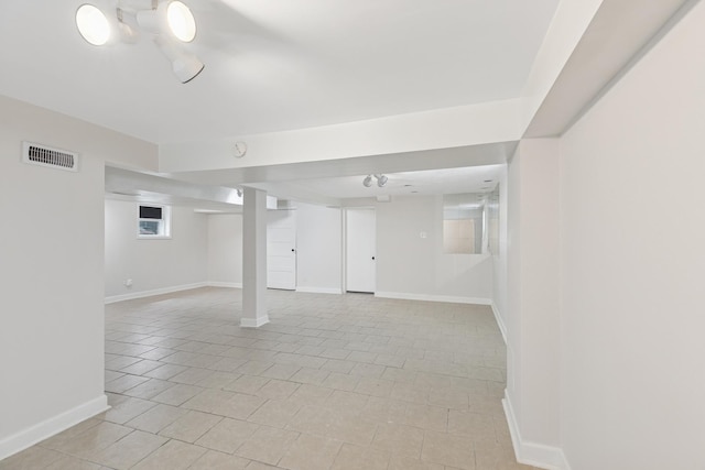 334 153rd St, Calumet City, IL 60409 - basement featuring light tile patterned floors and baseboards