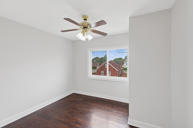 334 153rd St, Calumet City, IL 60409 - spare room with dark wood finished floors and ceiling fan