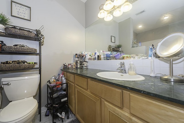 1621 S Halsted St Unit 405, Chicago, IL 60608 - bathroom with vanity, tile patterned floors, and a chandelier