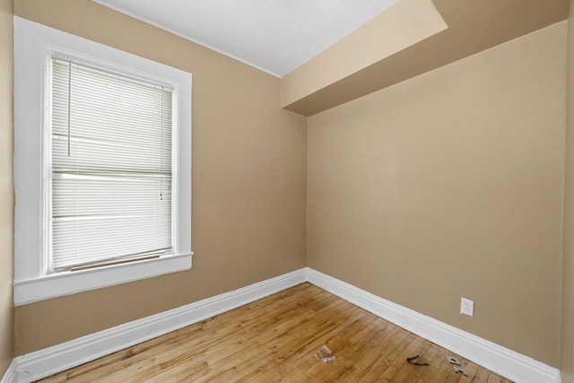 5938 S La Salle St, Chicago, IL 60621 - unfurnished room with baseboards and light wood-style floors