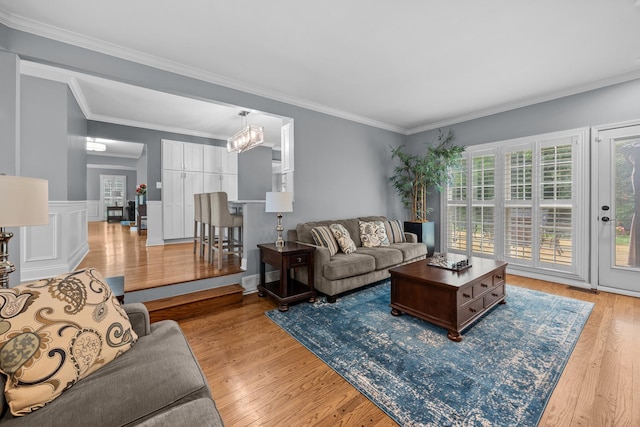 3 Old Valley Rd, Rolling Meadows, IL 60008 - living area featuring light wood-style flooring and ornamental molding