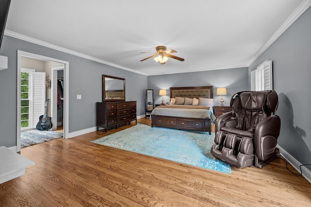 3 Old Valley Rd, Rolling Meadows, IL 60008 - bedroom with wood finished floors, ornamental molding, a walk in closet, and a ceiling fan