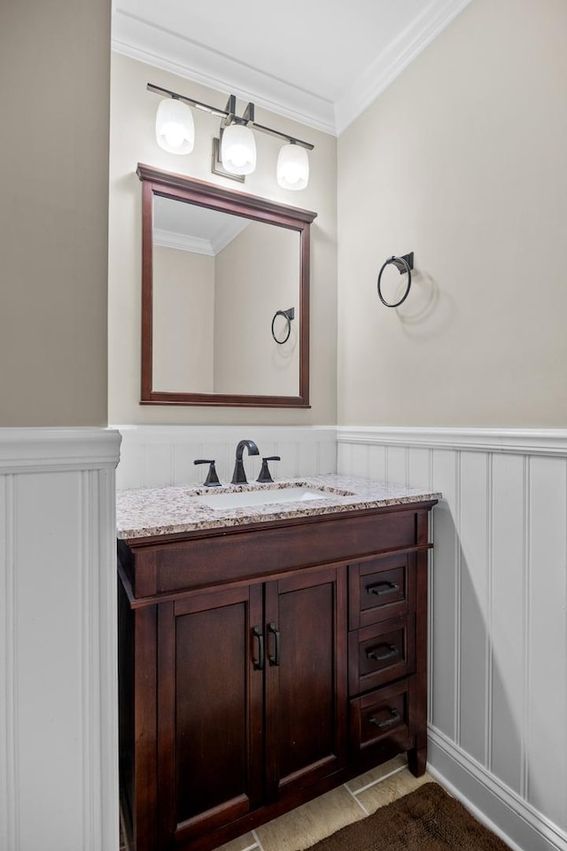 3 Old Valley Rd, Rolling Meadows, IL 60008 - bathroom with vanity, ornamental molding, a decorative wall, and a wainscoted wall