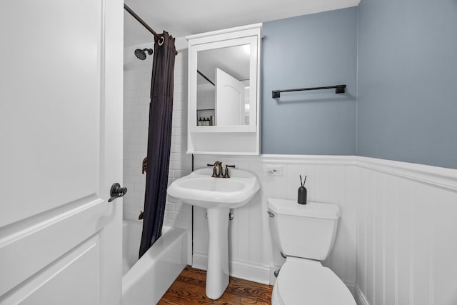 3 Old Valley Rd, Rolling Meadows, IL 60008 - bathroom featuring shower / bathtub combination with curtain, wainscoting, and wood finished floors