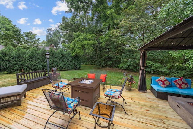 3 Old Valley Rd, Rolling Meadows, IL 60008 - deck featuring an outdoor living space with a fire pit, view of wooded area, and a lawn