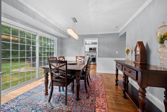 3 Old Valley Rd, Rolling Meadows, IL 60008 - dining space with crown molding, wainscoting, and wood finished floors