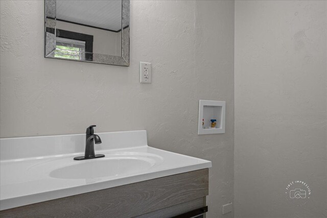 32W167 Army Trail Rd, Wayne, IL 60184 - bathroom with vanity and a textured wall