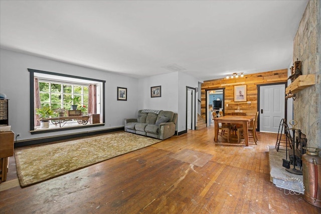 32W167 Army Trail Rd, Wayne, IL 60184 - living room with hardwood / wood-style floors and wooden walls