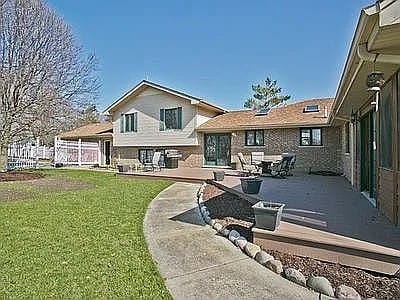 9417 W Steger Rd, Frankfort, IL 60423 - back of property with a patio and a yard