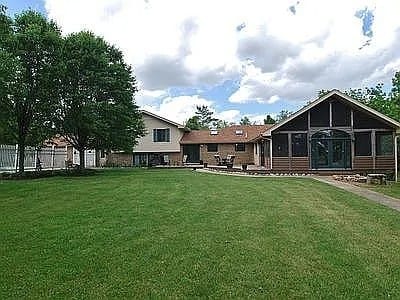 9417 W Steger Rd, Frankfort, IL 60423 - view of grassy yard with a sunroom