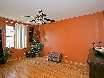 9417 W Steger Rd, Frankfort, IL 60423 - unfurnished room featuring ceiling fan and wood finished floors